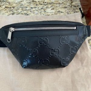 Gucci embossed black belt bag